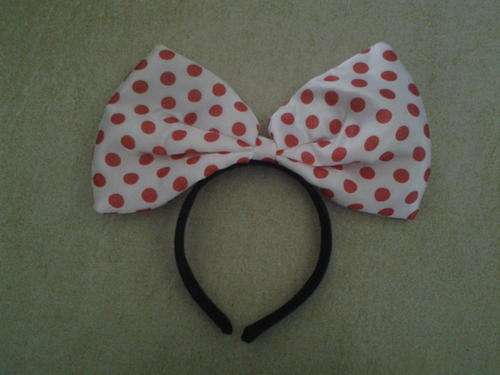 Minnie mouse aliceband with large bow, perfect for a party or concert