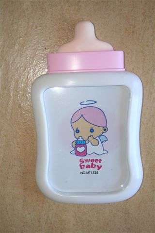 Plastic baby photoframe, sale price was R20