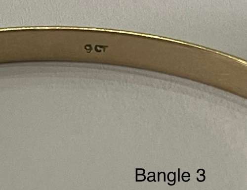 9CT SOLID GOLD BANGLE - 4mm WIDE and 62mm O/D  8.34 GRAMS - (BANG03)