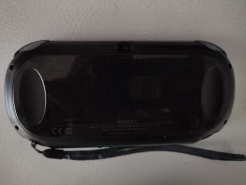 Playstation Vita, 5  PS Vita Games (In Covers) and 4GB PS Vita Memory Card with Charger