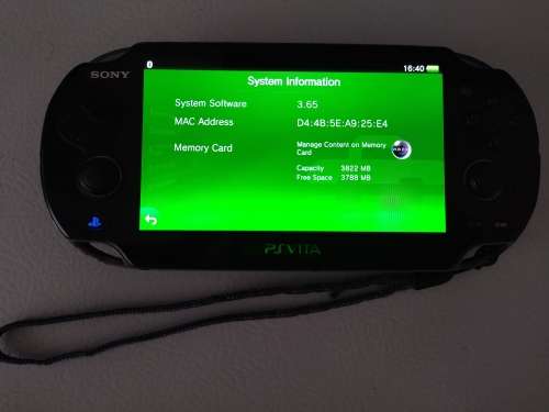 Playstation Vita, 5  PS Vita Games (In Covers) and 4GB PS Vita Memory Card with Charger