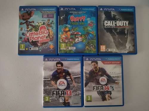 Playstation Vita, 5  PS Vita Games (In Covers) and 4GB PS Vita Memory Card with Charger
