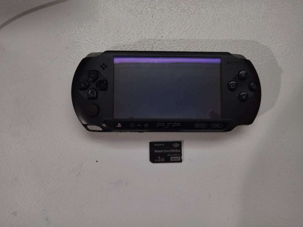 PSP - E1000 series console + 11 Games (UMD`s)