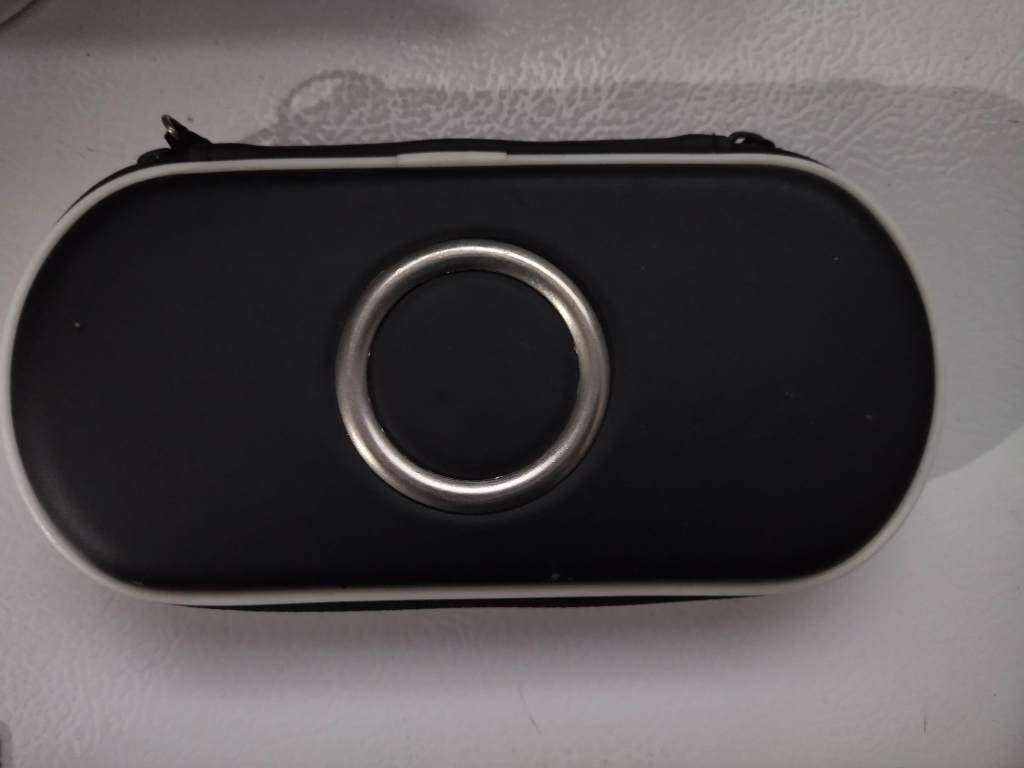 PSP - E1000 series console + 12 Games (UMD`s)