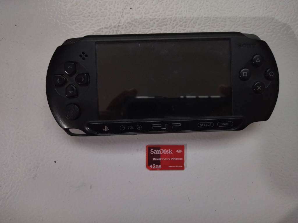 PSP - E1000 series console + 12 Games (UMD`s)