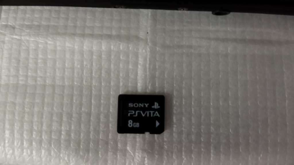 Sony Playstation Vita Slim Edition(IMMACULATE CONDITION) + 12 Games + 8GB Card + SD2Vita + Extras