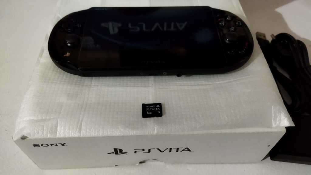 Sony Playstation Vita Slim Edition(IMMACULATE CONDITION) + 12 Games + 8GB Card + SD2Vita + Extras