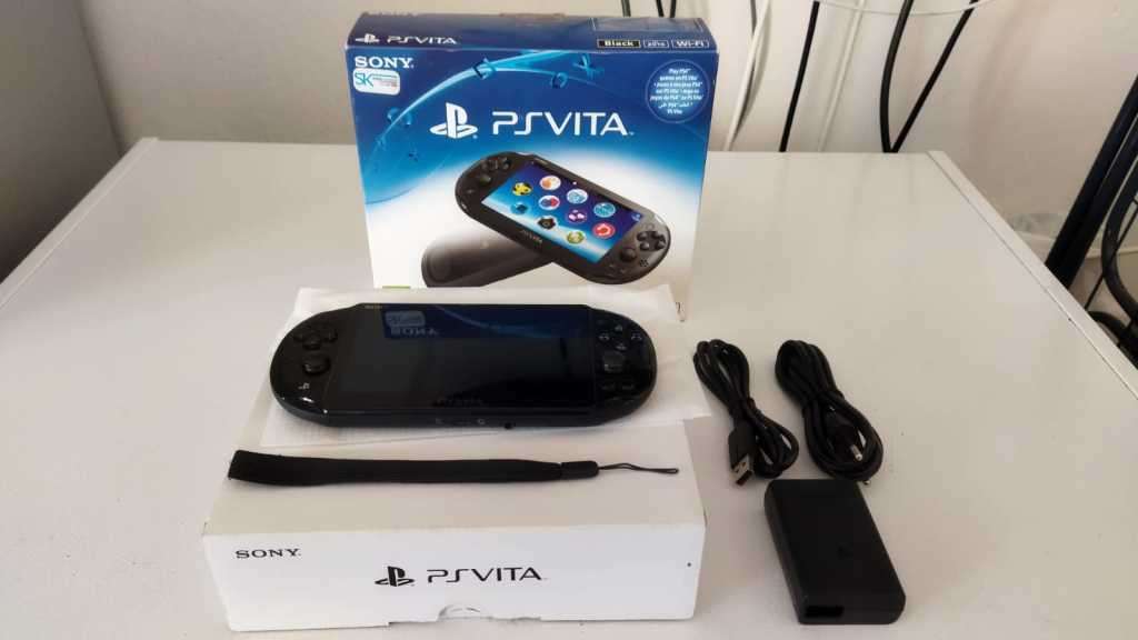Sony Playstation Vita Slim Edition(IMMACULATE CONDITION) + 12 Games + 8GB Card + SD2Vita + Extras