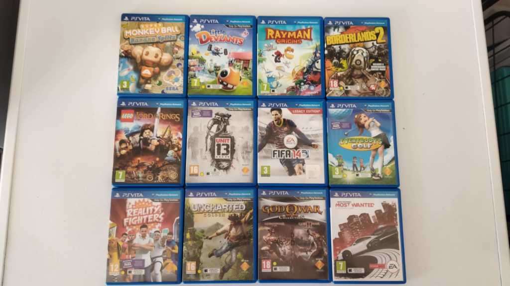 Sony Playstation Vita Slim Edition(IMMACULATE CONDITION) + 12 Games + 8GB Card + SD2Vita + Extras