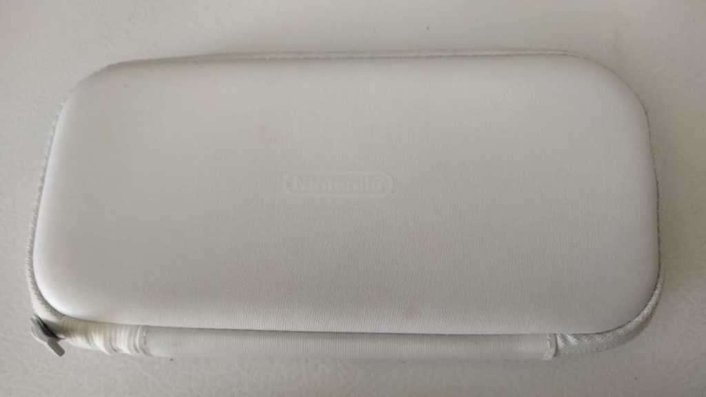 Nintendo Switch Lite (Turquoise) + Sealed Game + Protective Cover + Carrying Pouch