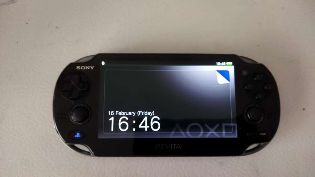 Sony Playstation Vita + Charger