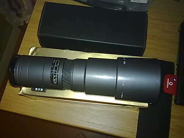 Sigma 400mm F auto focus lens. Minolta or Sony Alpha range SLR or DSLR