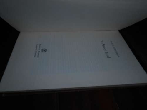 KAREL SCHOEMAN -  'N ANDER LAND  - 1984 1STE ED. HUMAN & ROSSOUW HARDEBAND