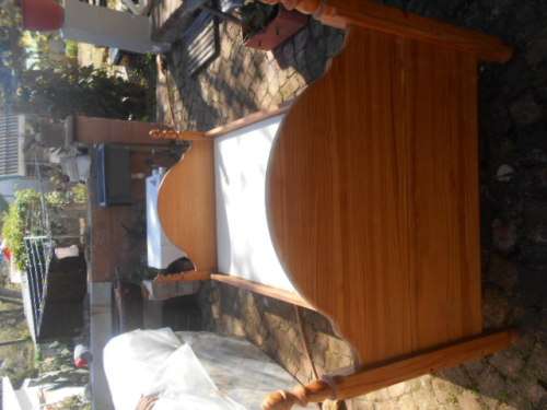 Single pine high foot and low end bed frame with 2 good condition mattresses