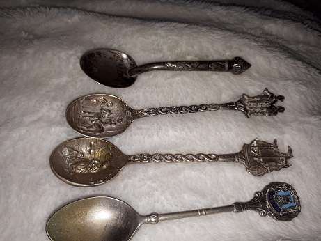 lot of old spoons and forks