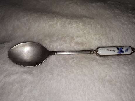 lot of old spoons and forks