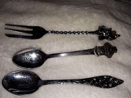 lot of old spoons and forks