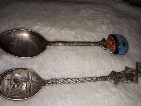 lot of old spoons and forks