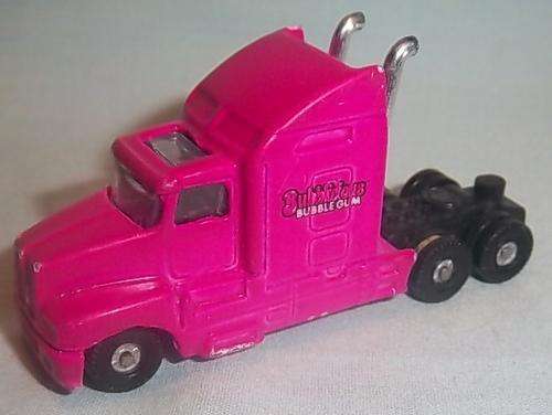 A PINK MINIATURE DIE CAST TRUCK ADVERTISING BUBBLEICIOUS BUBBLE GUM