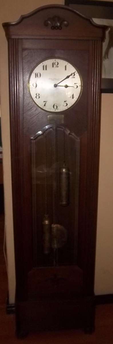 A VERY NICE GRANDFATHERS CLOCK BY SCHULTIS, SCHWAR & C0. CIRCA 1929, STARTING AT R1
