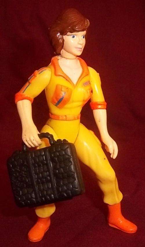 1ST EDITION APRIL O'NEIL FIGURE WITH HER SUITCASE