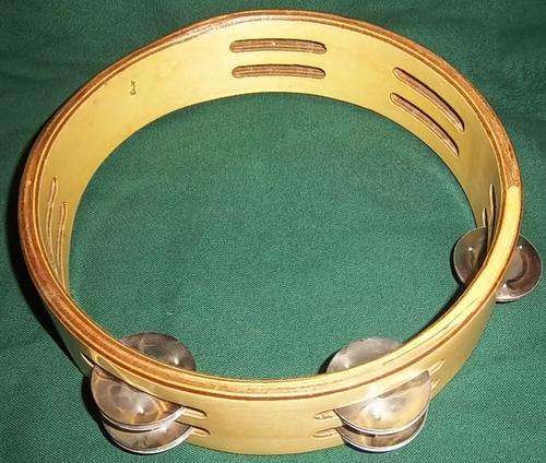 A WOODEN TAMBOURINE