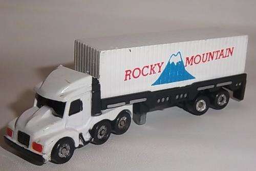 A MICRO MACHINES TRUCK WITH ROCKY MOUNTAIN TRAILER
