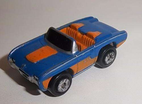 A BLUE AND ORANGE CONVERTIBLE CAR BY MICRO MACHINES