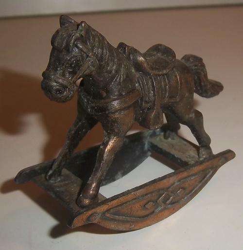 A MINIATURE METAL ROCKING HORSE BY DURHAM INDUSTRIES #1
