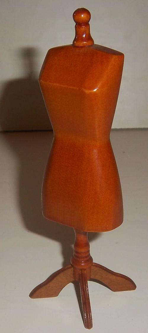 A VINTAGE WOODEN MANNEQUIN FOR A DOLL HOUSE
