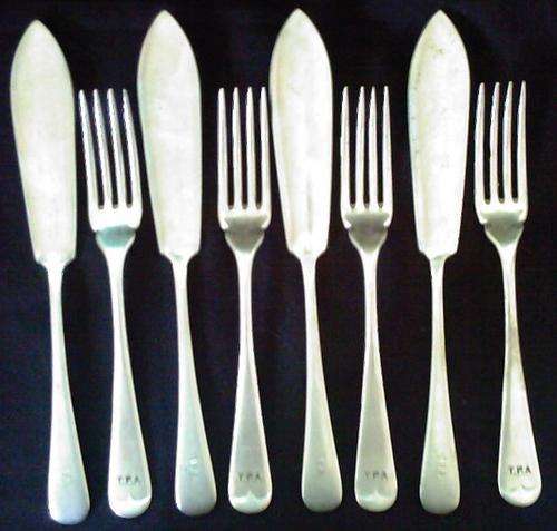 A TPA FISH KNIFE AND FORK SET STARTING AT R1