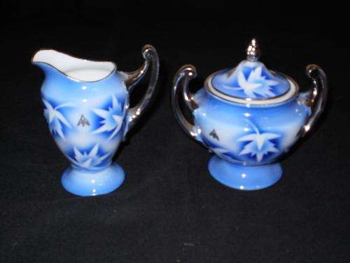 A STUNNING MILK JUG AND SUGAR BOWL............HAVE A LOOK......