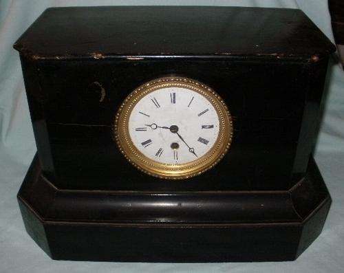 A VERY UNUSUAL MANTLE CLOCK