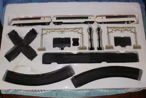A VERY NICE 34 PIECE TOY TRAIN SET STARTING AT R1