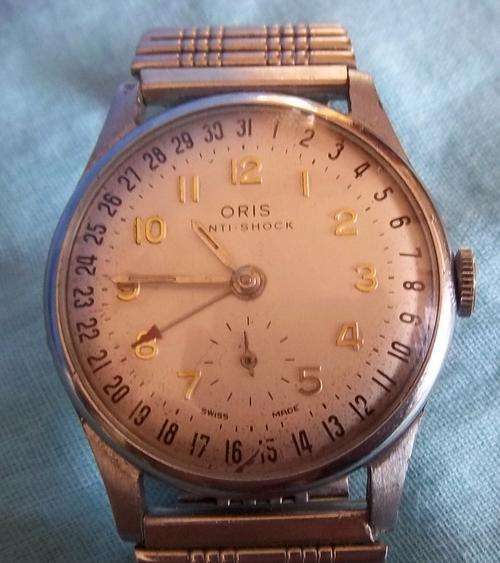 A STUNNING ORIS MECHANICAL MEN'S WATCH WITH DATE ON OUTSIDE OF DIAL