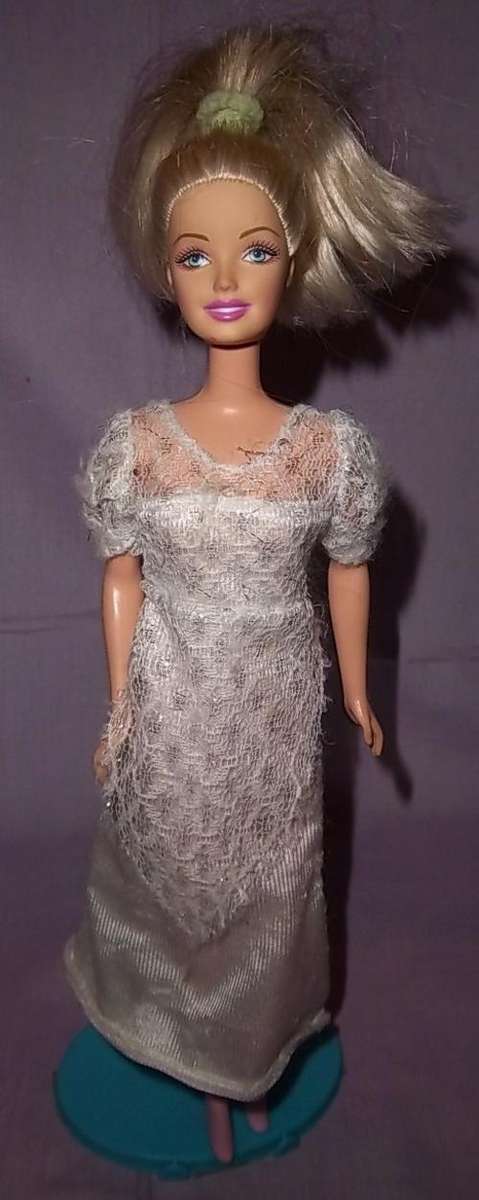 BARBIE BY MATTEL WITH A WHITE DRESS