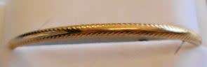 **9ct Gold Oval Bangle**