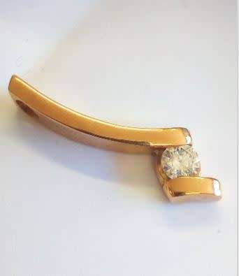 **IGL Certified 0.56ct Diamond Solitaire Pendant - Beautiful and Unique Design**