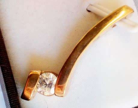 **IGL Certified 0.56ct Diamond Solitaire Pendant - Beautiful and Unique Design**