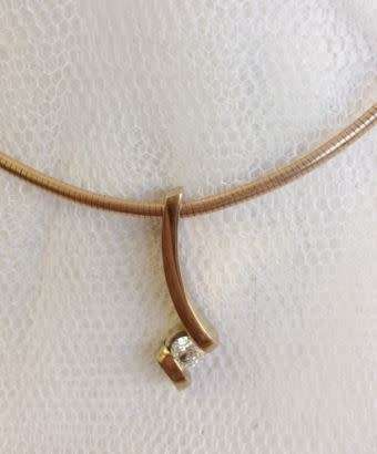 **IGL Certified 0.56ct Diamond Solitaire Pendant - Beautiful and Unique Design**