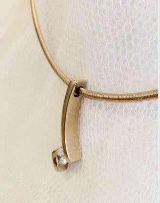 **IGL Certified 0.56ct Diamond Solitaire Pendant - Beautiful and Unique Design**