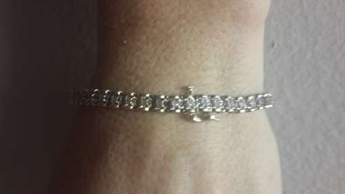 Beautiful refurbished solid 9ct yellow gold and diamond ladies tennis bracelet.