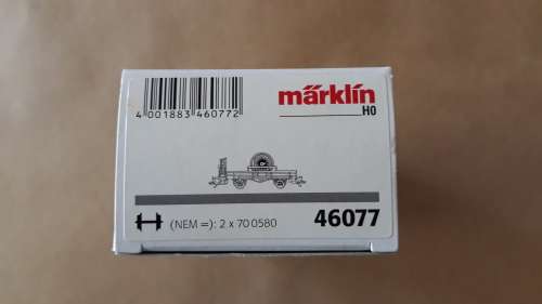 Marklin 46077 HO Gauge Low Side Car with brakeman`s cabin, loaded with wheel set for Class 05 loco