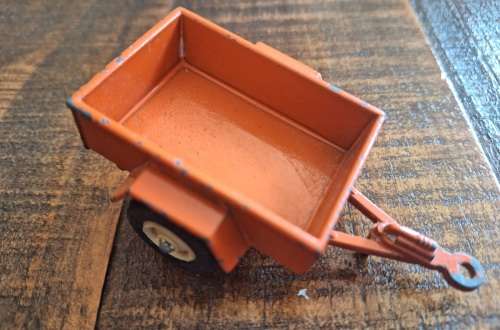 vintage britains jeep 1976 and included is  britains 1982 orange cargo trailer