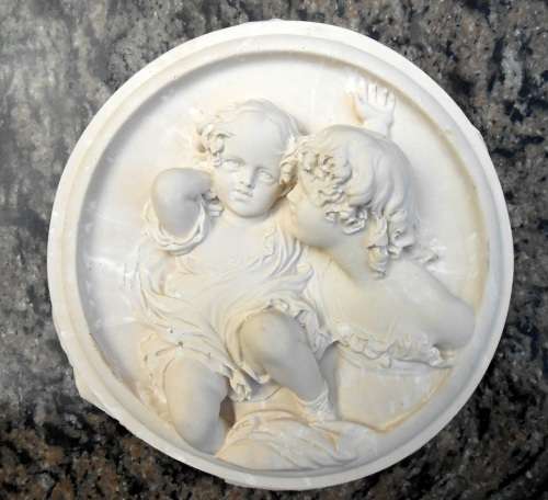 Antique style plaque of girl and baby