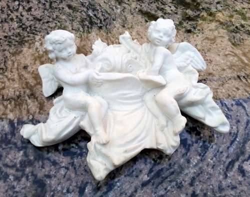 Antique style plaque of Two Angels