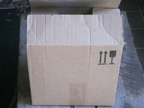 BOX OF STAMPS ON PAPER - MIXED WORLD BUT MAINLY SOUTH AFRICA