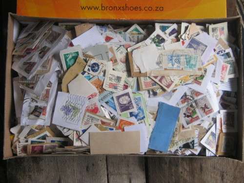 SHOEBOX OF STAMPS ON PAPER - 1000's OF MIXED WORLD