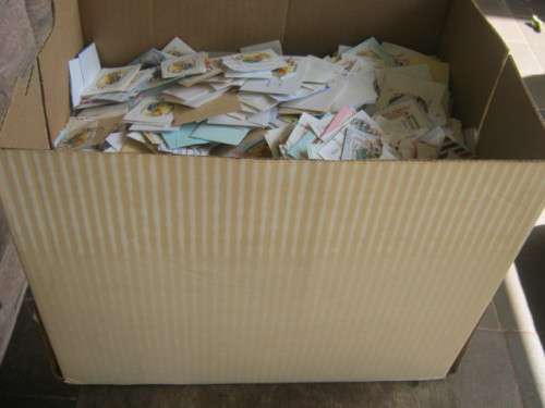 BOX ALMOST FULL OF RSA 1995 MASAKHANE STAMPS ON PAPER