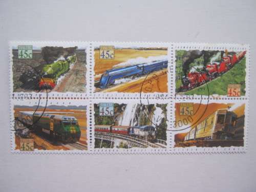 THEMATICS - AUSTRALIA - TRAINS - SETENANT BLOCK OF 6 - CTO - BID PER STAMP